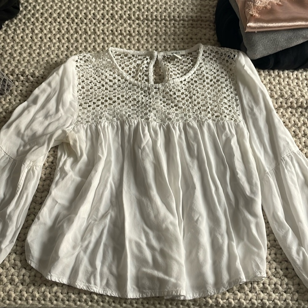 White flowy top